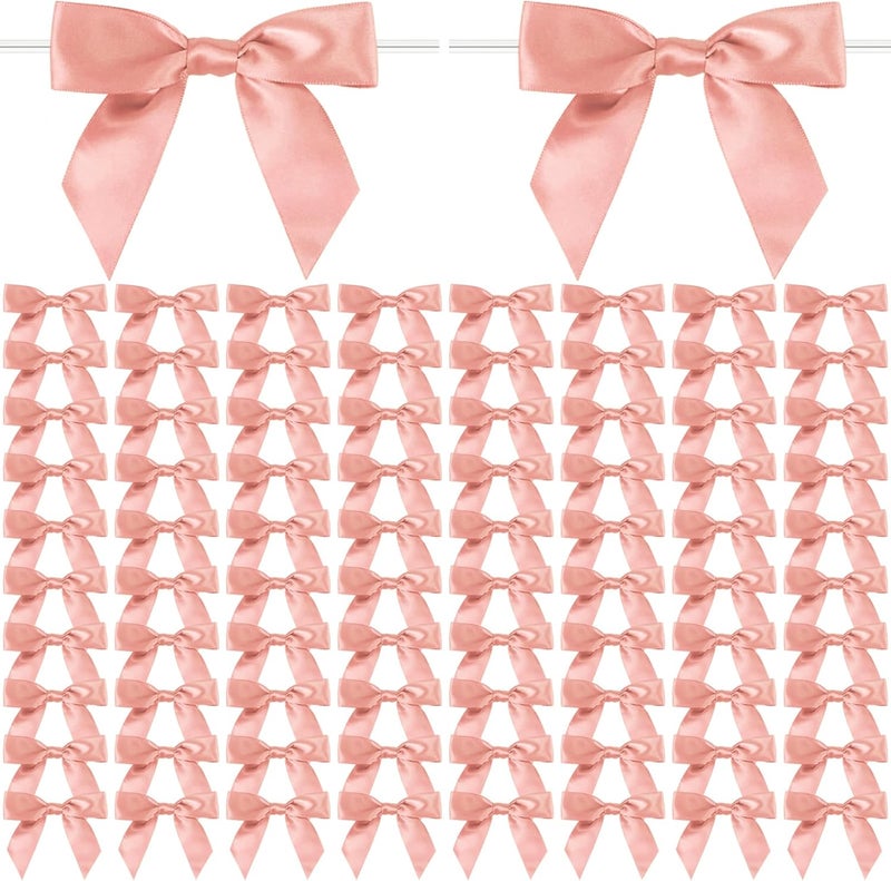 Adodotoe Rose Gold Twist Tie Bows, 100 Pcs Satin Twist Tie Bows for Treat Bag Satin Ribbon Tie Bows for Tying Up Packages Present Bags Bakery Candy Bags Decorating Ribbon Bow Gift Wrap Bows - Image 1